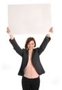 Happy busy business woman holding cardboard sign as copy space Royalty Free Stock Photo