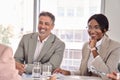 Happy busy diverse executive business people communicating at office meeting.