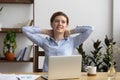 Happy calm business woman employee take break at work desk