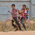 Children riding a pushbike together