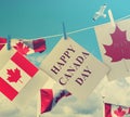 Happy Canada Day. Holiday greeting cards with Maple leaf and Canadian flag. Royalty Free Stock Photo