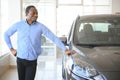 Happy Car Buyer, New Car Owner Concept. Portrait Of Excited Young African American Guy In Dealership Showroom Royalty Free Stock Photo