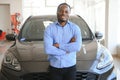 Happy Car Buyer, New Car Owner Concept. Portrait Of Excited Young African American Guy In Dealership Showroom Royalty Free Stock Photo