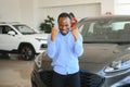 Happy Car Buyer, New Car Owner Concept. Portrait Of Excited Young African American Guy In Dealership Showroom Royalty Free Stock Photo