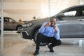 Happy Car Buyer, New Car Owner Concept. Portrait Of Excited Young African American Guy In Dealership Showroom Royalty Free Stock Photo