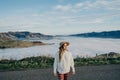 Happy carefree asian woman enjoying nature with layers of mountains and the mist in the morning at The peak of Bank Peninsula, Royalty Free Stock Photo