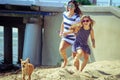 Happy carefree family running on beach at sea. Royalty Free Stock Photo