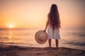 Happy Carefree Girl on the Beach at Sea Sunrise