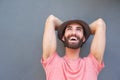 Happy carefree man laughing with hat Royalty Free Stock Photo