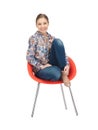 Happy and carefree teenage girl in chair Royalty Free Stock Photo