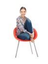 Happy and carefree teenage girl in chair Royalty Free Stock Photo