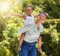 Happy and carefree. a young mother and daughter spending time together in nature. Royalty Free Stock Photo