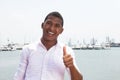 Happy caribbean guy showing thumb up outside Royalty Free Stock Photo