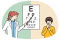 Female ophthalmologist check eyesight of boy child