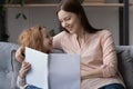 Loving mom and small daughter read book together Royalty Free Stock Photo