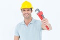 Happy carpenter holding monkey wrench Royalty Free Stock Photo