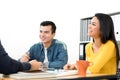 Happy casual business people laughing and smiling in the meeting Royalty Free Stock Photo