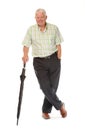 Happy casual mature man with umbrella Royalty Free Stock Photo
