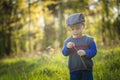 Happy caucasian boy playing outdoor Royalty Free Stock Photo