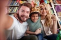 Happy caucasian couple with adopted afro american child