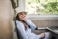 Caucasian Girl Laughing While Seating Inside a Camper Van