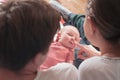 Happy parents holding their newborn baby girl Royalty Free Stock Photo