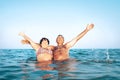 A happy caucasian senior couple enjoys their sea vacation on the