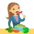 Caucasian woman eating healthy vegetable salad.