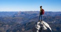 Happy celebrating winning success woman having reached mountain top Royalty Free Stock Photo