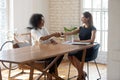 Happy CEO handshake greeting confident biracial employee at interview