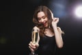 Happy charming young woman drinking champagne Royalty Free Stock Photo