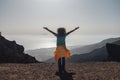 Happy and cheerful adult woman enjoy nature in high mountain in outdoor leisure activity - concept of happiness and travel in wild Royalty Free Stock Photo