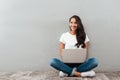 Happy cheerful asian woman working on laptop computer Royalty Free Stock Photo