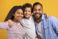 Happy cheerful black family father, mother and preteen son taking selfie together Royalty Free Stock Photo