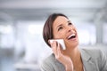 Happy, cheerful businesswoman smiling and laughing on mobile phone call in modern office. Corporate executive female Royalty Free Stock Photo