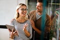 Happy cheerful couple in love using digital tablet together. Online shopping social media concept. Royalty Free Stock Photo