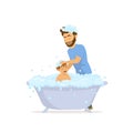 Happy cheerful father washing bathing child in a bathtub Royalty Free Stock Photo