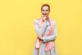 Happy cheerful girl with freckles and bun hair, looking at came Royalty Free Stock Photo