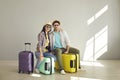 Happy cheerful and pleasant couple ready for vacation travel posing portrait