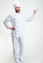 Happy chef cook showing welcome gesture Royalty Free Stock Photo