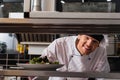 happy chef holding plate with freshly Royalty Free Stock Photo