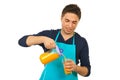 Happy chef man pouring orange juice Royalty Free Stock Photo