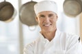 Happy Chef In Restaurant Kitchen