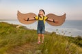 Happy child against blue sea and sky background Royalty Free Stock Photo