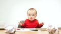 Happy child baby girl toddler sitting with keyboard of computer isolated on a white background Royalty Free Stock Photo