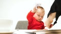 Happy child baby girl toddler sitting with keyboard of computer isolated on a white background Royalty Free Stock Photo