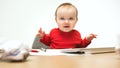 Happy child baby girl toddler sitting with keyboard of computer isolated on a white background Royalty Free Stock Photo