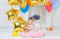 Happy child with balloons on his first birthday Royalty Free Stock Photo