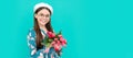 happy child in beret with tulips. mothers or womens day. kid in glasses. Banner of spring child girl with tulips flowers Royalty Free Stock Photo
