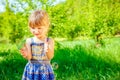 Happy child blowing bubbles on nature in pairs Royalty Free Stock Photo